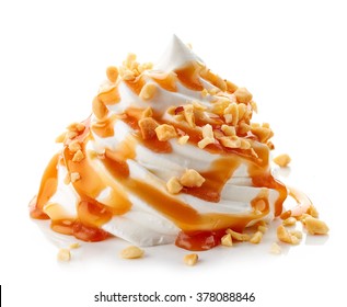 Whipped Cream With Caramel Sauce And Nuts Isolated On White Background