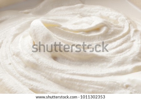 Whipped cream close-up textured background 
