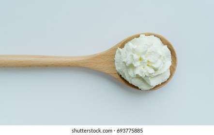 Whipped Cream On A Spoon With White Background