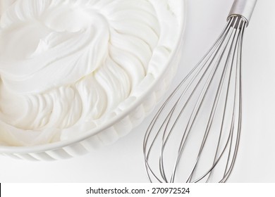 Whipped Cream And  A Whisk