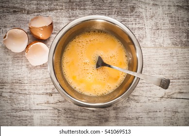 Whipped Eggs On Wood Table. Top Of View. Prepare Breakfast From Eggs.