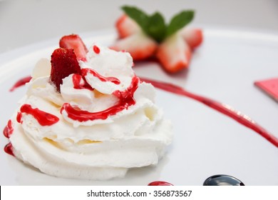 Whipping Cream With Strawberry Sauce