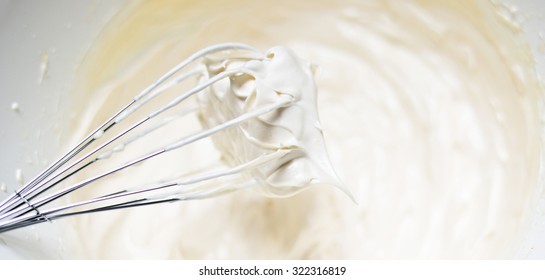 Whipping Cream With A Whisk Close Up