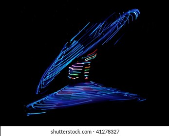 Whirling Egyptian Dervish with lights in the dark dancing