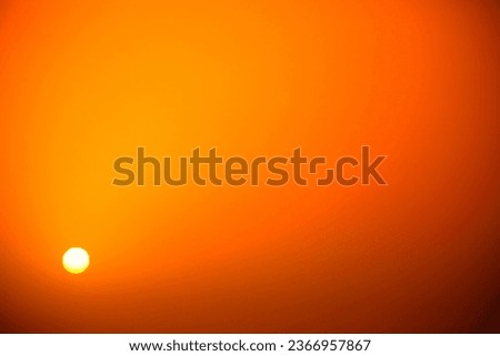 Whirling Particles, Setting Sun: Capturing the Elegance of a Dusty Twilight