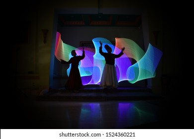 whirling Sufi dance in silhouette
