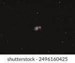 The Whirlpool Galaxy Seen Through A 80 mm Refractor Telescope