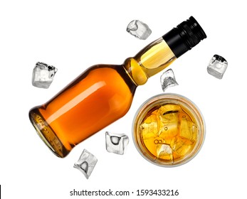 Whiskey Bottle With A Full Glass And  Ice Cubes, Top View