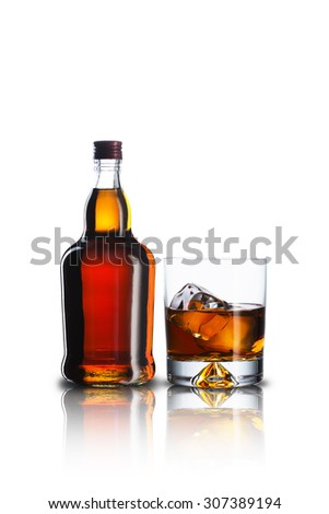 Whiskey Bottle and Glass With Ice Cubes
