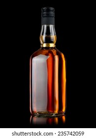 Whiskey bottle on black background