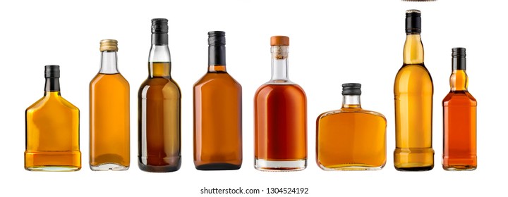  Whiskey Bottles Isolated Over A Whte Background 