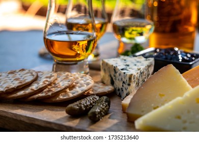 Whiskey And Cheese Pairing, Tasting Whisky Glasses And Plate With Sliced Cheeses Close Up