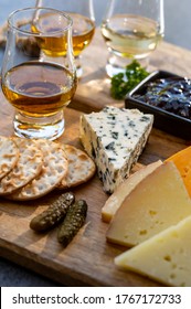 Whiskey And Cheese Pairing, Tasting Whisky Glasses And Plate With Sliced Cheeses Close Up