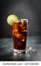 Whiskey Cola Cocktail On A Dark Background