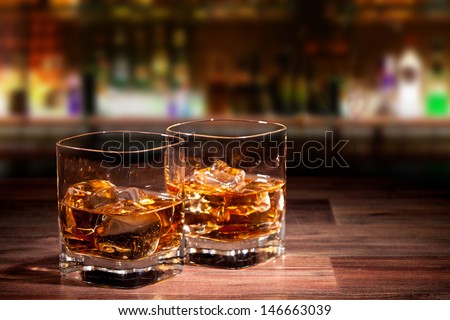 Whiskey drinks on wood