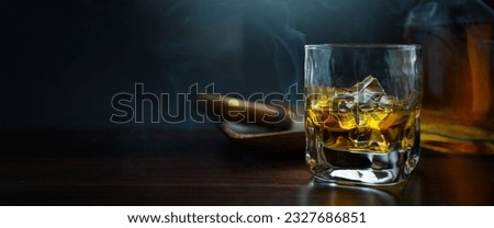 whiskey glass, cigar and bottle; luxurious men's club banner background with copy space 
