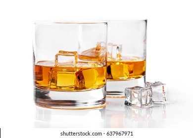 Whiskey Glasses With Ice Cubes Isolated On White Background