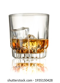Whiskey with ice cubes, isolated on the white background, clipping path included.