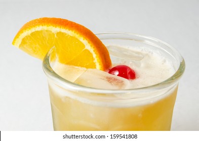 Whiskey Sour With Cherry And Orange Slice