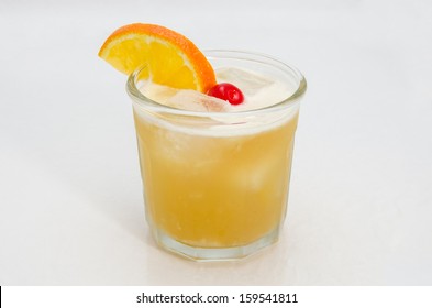 Whiskey Sour With Cherry And Orange Slice