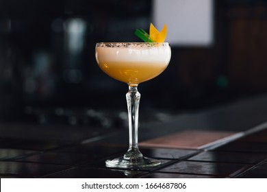 Whiskey Sour Cocktail At Bar Background. Closeup.