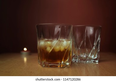 Whiskey and tea light candle - Powered by Shutterstock