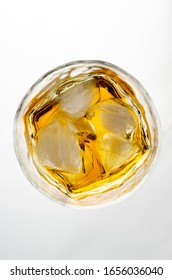 Whiskey Or Whisky In Glass From Top View Isolated On White Background