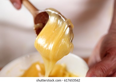 Whisking Emulsion. Making Mayonnaise With A Wooden Spoon.