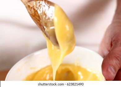 Whisking Emulsion. Making Mayonnaise With A Wooden Spoon.