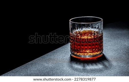 Whisky, bourbon or cognac. Hard strong alcoholic drink, place for text, top view.