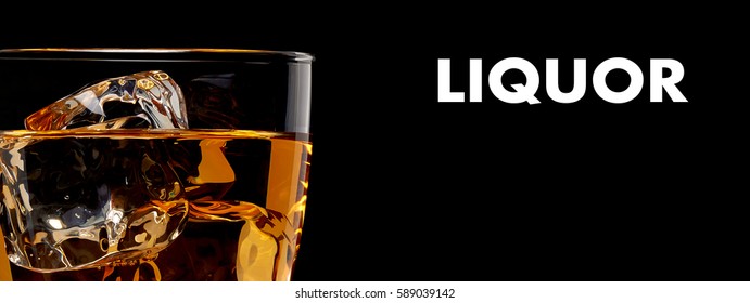 Whisky Or Whiskey In Glass Isolated On Black Background