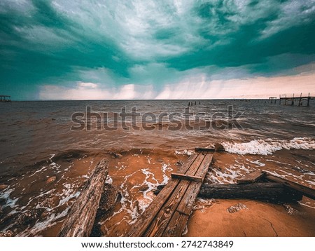 whispy clouds play in waves