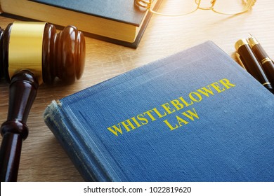 Whistleblower Law On A Court Desk.