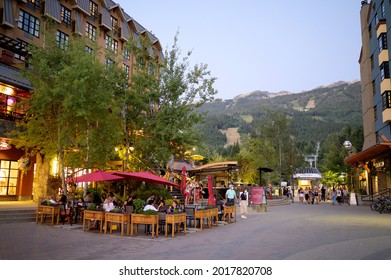 Whistler BC, Canada - July 30, 2021:  Tourists On The Patio Of A Local Whistler Restaurant On A Warm Summer Night.  