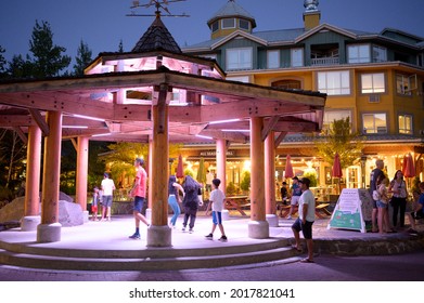 Whistler BC, Canada - July 30, 2021:  Tourists On The Patio Of A Local Whistler Restaurant On A Warm Summer Night.  