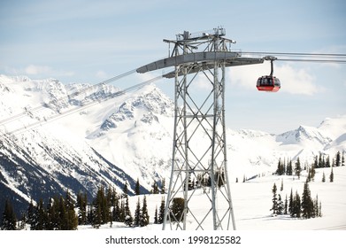 Whistler BC, Canada - March 27, 2013:  The Whistler Peak 2 Peak Gondola Runs Past A Snow Covered Mountain. 






