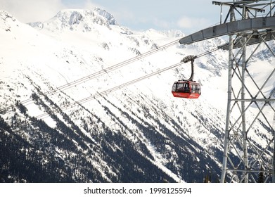 Whistler BC, Canada - March 27, 2013:  The Whistler Peak 2 Peak Gondola Runs Past A Snow Covered Mountain. 






