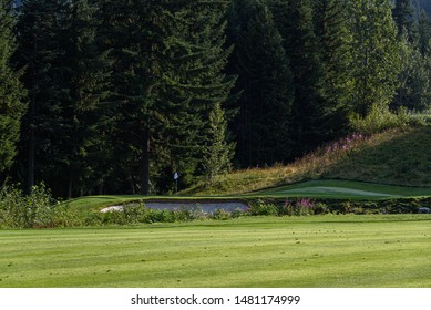 WHISTLER, BC/CANADA – AUGUST 3, 2019: Fairmont Chateau Whistler Golf Club Morning Fairway And Green.
