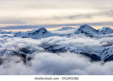 Whistler, British Columbia, Canada. Beautiful View Of The Canadian Snow Covered Mountain Landscape During A Cloudy And Vibrant Winter Day.