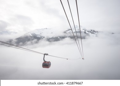 WHISTLER, CANADA - FEBRUARY 3, 2015: Heading into the clouds on the world's largest free span gondola in Whistler, Canada