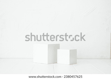 White 2 square stage for products display for products showcase on texture background, promotion display. Real photo white square podiums. Minimal concept. Copy space 