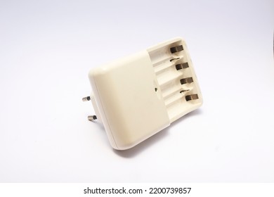 White AA Battery Charger With Capacity To Charge Four Batteries.