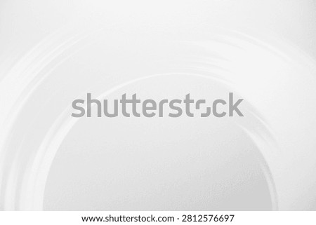 White abstract background with a circular pattern. Copy space for text.