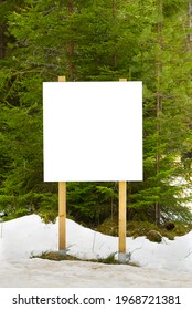 White Advert Billboard Placeholder, Blank Information Poster In Forest. White Empty Bulletin Board In Winter Pine Forest For Outdoor Info Banner. Mockup