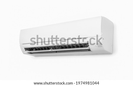 white air conditioner installation on the white wall background. electricity home appliance. cooling product for hot climate in summer.