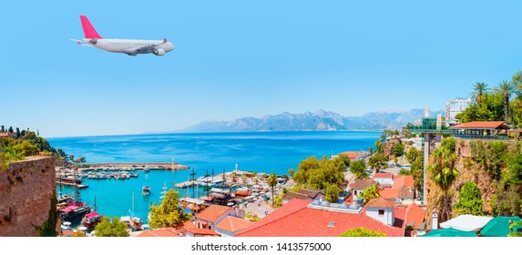 White An Air Plane Fly Over The Old Town Kaleici - Antalya, Turkey