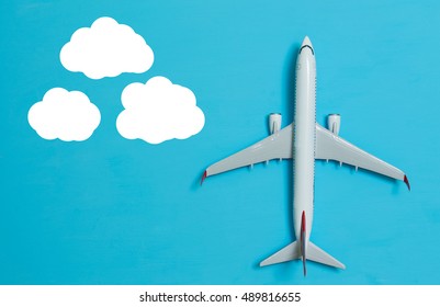 White Airplane On A Blue Background, Top View