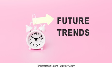 White Alarm Clock In Pink Background With Text - Future Trends. Concept Of Time. Banner With Alarm Clock. The Concept Of World Business, Marketing, Finance And Time