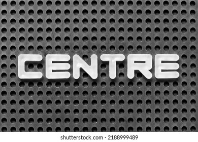 White Alphabet Letter In Word Centre On Black Pegboard Background