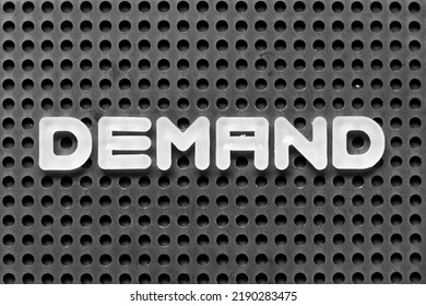 White Alphabet Letter In Word Demand On Black Pegboard Background